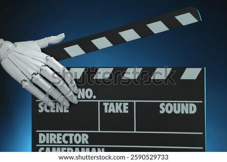 Artificial intelligence. Robot hand with clapper against dark blue background, closeup