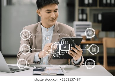 Artificial Intelligence technology. Businessman using a tablet and laptop computer chatting with an intelligent artificial intelligence. Futuristic technology, automate Chat Bot, Smart Ai.