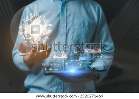 Artificial intelligence technology concept a man using digital tablet and holding crystal glob with AI text on electronic circuit board and virtual data charts