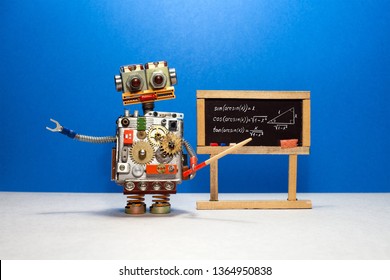 Artificial intelligence and trigonometry lesson in college. Robot teacher explains theory inverse trigonometric functions. Classroom interior with handwritten formula black chalkboard - Powered by Shutterstock