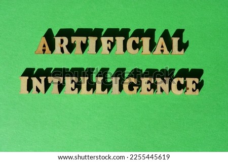 Artificial Intelligence, words in wooden alphabet letters isolated on bright green background