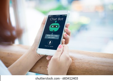 artificial intelligence,AI chat bot concept.close-up of Female hands holding mobile phone