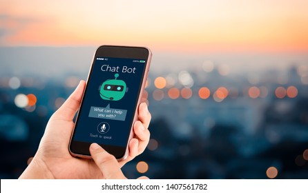 Artificial Intelligence,AI Chat Bot Concept.Hands Holding Mobile Phone On Blurred Urban City As Background