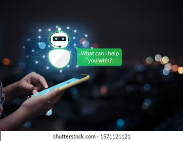 Artificial Intelligence,AI Chat Bot Concept.Hands Holding Mobile Phone On Blurred Urban City As Background