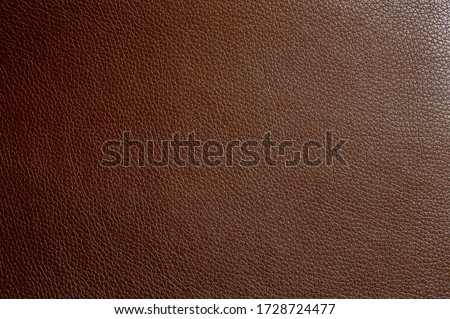 Artificial leather the color of milk chocolate. Faux leather texture
