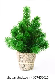 Artificial Pine Tree In Pot Isolated On White