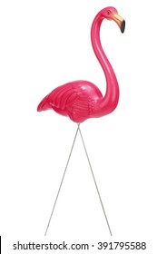 Artificial pink flamingo on white background