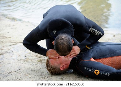 Artificial respiration. Lifeguard giving drowning mouth-to-mouth resuscitation. August 10,2018. Kiev, Ukraine