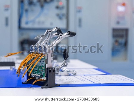 Artificial robotic hand at the presentation of robotics.Creation of artificial intelligence