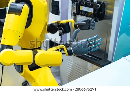 Artificial robotic hand at the presentation of robotics.Creation of artificial intelligence