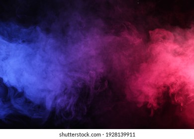 Artificial Smoke In Red-blue Light On Black Background In Darkness