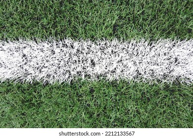Artificial Turf With A White Stripe Close-up