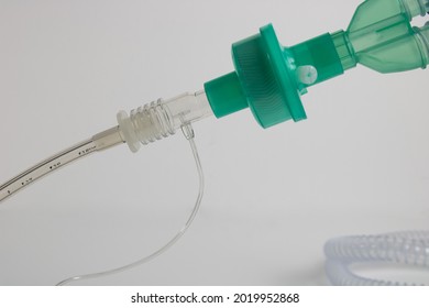 Artificial ventilation. Endotracheal tube, airway adapter to capnography, mechanical filter and breathing circuit.  Mechanically ventilated patient aiway management