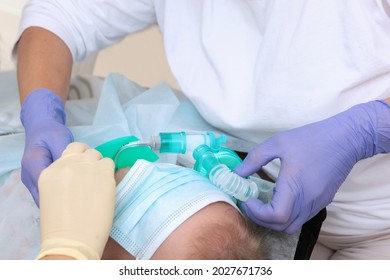 Artificial Ventilation Of The Lungs. Child's Face Is Covered With A Mask. A Breathing Tube In The Mouth. The Child Is Under Anesthesia. Preparing For Surgery. Copy Space.