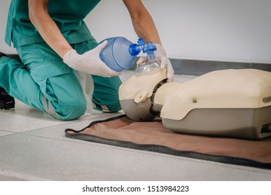 Artificial ventilation using bag valve mask (Ambu bag) - Powered by Shutterstock