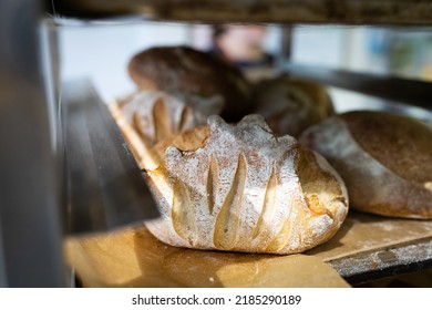 Artisan Bread On The Counter In The Bakery. The Process Of Making Bread. Vertical Photo.