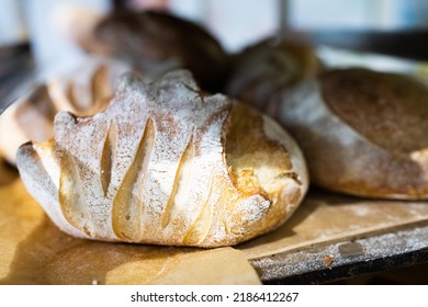 Artisan Bread On The Counter In The Bakery. The Process Of Making Bread. Vertical Photo.