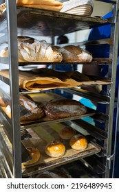 Artisan Bread On The Counter In The Bakery. The Process Of Making Bread. Vertical Photo.