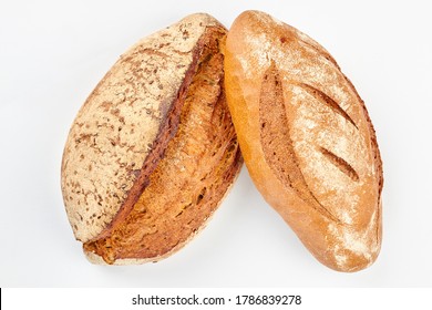 Artisan Bread On White Background. Two Loaves On Wheat Bread On White Background.