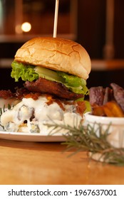 Artisan Burger With Bacon, Sauce, Lettuce And Homemade Bread