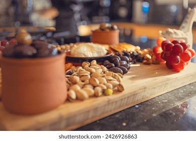 Artisan Charcuterie board with various foods - Powered by Shutterstock