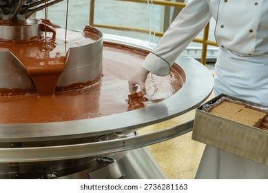 Artisan chocolate melting and quality checking. Meticulous factory procedure for smooth chocolate preparation and inspection