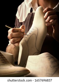 Artisan designing leather men shoes. - Shutterstock ID 1657696837