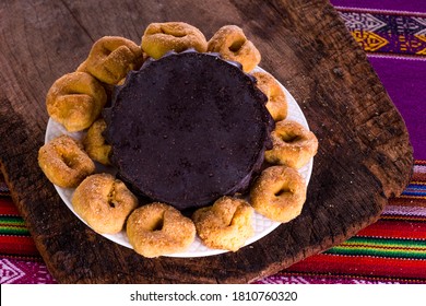 Artisan Donuts From The Peruvian Andes With Pure Cocoa Chocolate On Wooden Background With White Delicacy From The Andes Of Peru