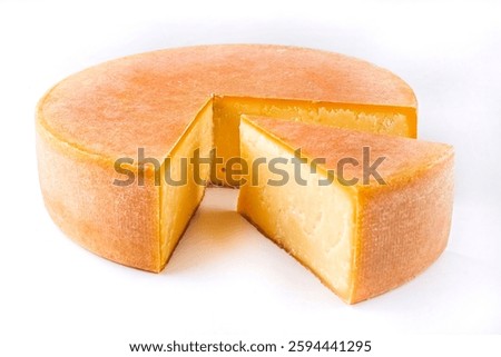 artisan handcrafted rustic hard mountain cheese wheel Bergkäse