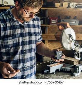 Artisan working with wood - Shutterstock ID 755960467