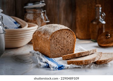 Artisanal sourdough bread ingredients on a table - Powered by Shutterstock