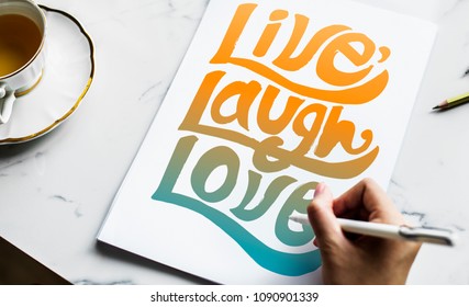 An artist creating hand lettering artwork - Powered by Shutterstock