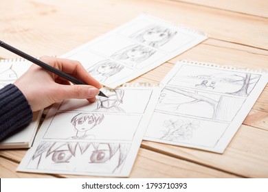 Artist drawing an anime comic book in a studio. - Shutterstock ID 1793710393