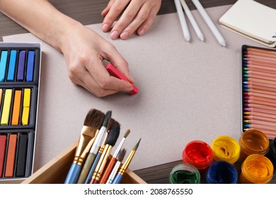 Artist Drawing With Chalk Pastel At Wooden Table, Closeup