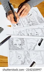 The Artist Draws Frames Of Comic Book Characters. An Animator Designer Creates A Storyboard.