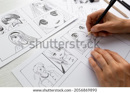 An artist draws a storyboard of an anime comics book. Manga style.