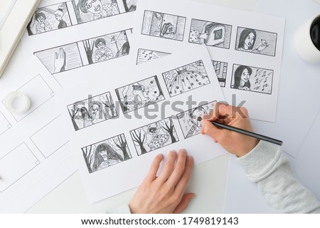 Artist illustrator draws a storyboard for the film. The animator creates sketches for the cartoon. ストックフォト © 