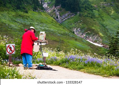 Artist outside in the field painting on his easel a landscape of the wildflowers in the mountains.  Copy space. - Powered by Shutterstock