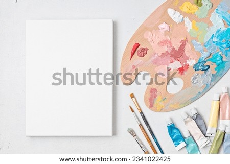 Artist painting palette with brushes. Craft hobby background. Recomforting, destressing hobby, art therapy