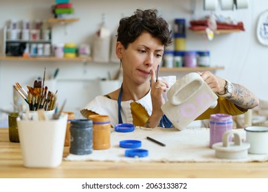 Artist Woman Creating Ornament For Decoration And Painting Pottery Earthenware. Small Ceramic Studio Owner Handiwork Entrepreneur Master Make Potter Jug For Sale In Handmade Craftsmanship Retail Store