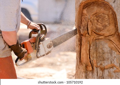 Artist Working During A Chainsaw Sculpture Contest On The Oregon Coast