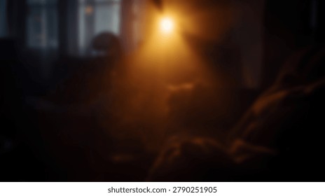 An artistic image of a dramatic light source illuminating a dark scene. Abstract shapes and shadows create a mysterious and evocative atmosphere. The image has a strong visual impact.