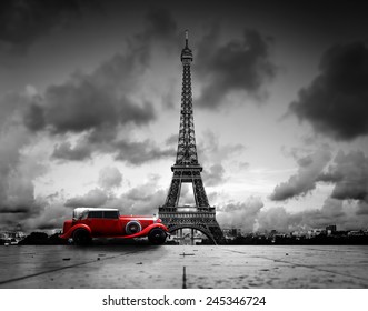 Artistic image of Effel Tower, Paris, France and red retro car. Black and white, vintage.