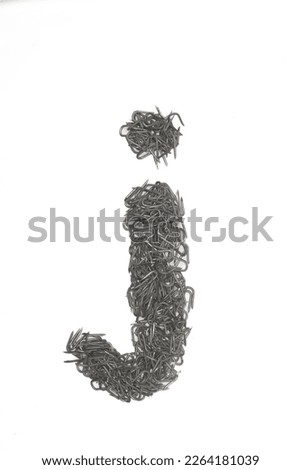artistic isolated lowercase Letter J made from steel staples isolated on a white background write, font, type style, 