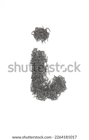 artistic isolated lowercase Letter I made from steel staples isolated on a white background write, font, type style, 