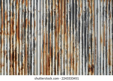 Artistic of old and rusty zinc sheet wall. Vintage style metal sheet texture.                                 - Shutterstock ID 2243333451