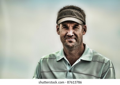 Artistic portrait of a male golfer