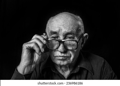 Artistic Portrait Of An Old Man With Glasses