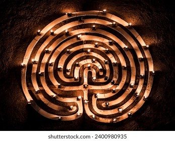 an artistic representation, made using lights and shadows, which forms a labyrinth