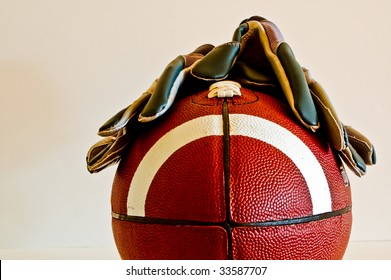 Artistic Shot Of American Football And Receiver Gloves